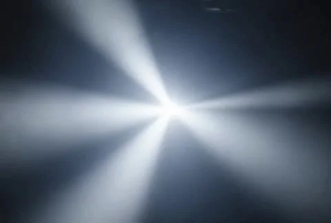Dynamic bright light moving slowly in a dark misty environment background, .. Stock Footage 325164089