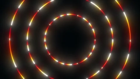 Dynamic circular light patterns swirl on a dark background in a mesmerizing Stock Footage 300434101
