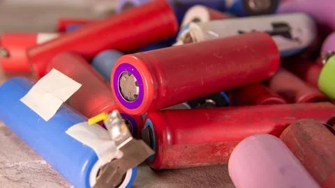 Dynamic close-up of bright lithium-ion batteries with sharp focus on the fo.. Stock Photos