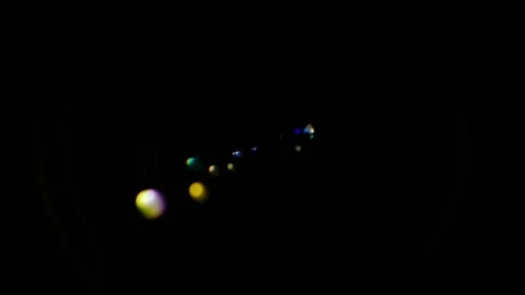 Dynamic close up of a camera lens aperture opening and closing with colorfu.. Stock Footage 334995851