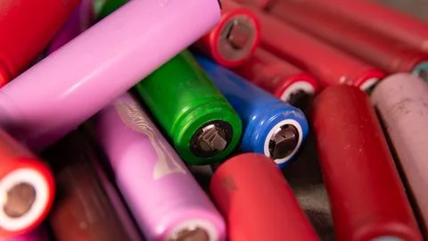 Dynamic Close-up of Lithium-ion Batteries: Tech Background 스톡 사진
