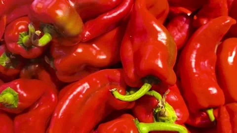 Dynamic close-up showcases vibrant red peppers, perfect for recipe inspiration Video stock 318311080