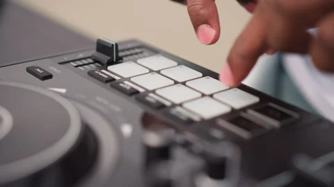 Dynamic closeup captures hands triggering lively street music elements, Vivid Stock Footage 346370140