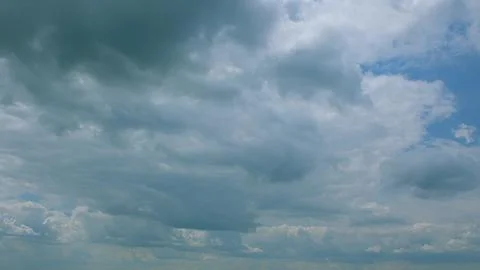 A Dynamic Cloud Formation is Creating Beautiful and Intricate Patterns Over a Br Stock Photos