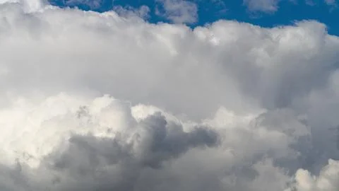 The Dynamic Cloud Formation Stands Out Beautifully Against a Bright Blue Sky Abo 写真素材