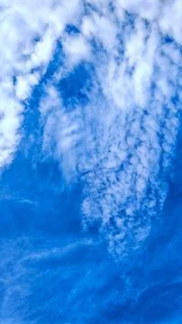 Dynamic Cloud Formations in Blue Sky Stock Photos
