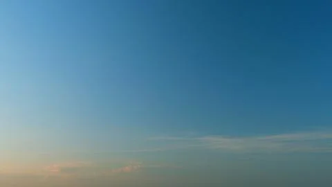 Dynamic cloud time-lapse from calm blue skies to cloudy. Puffy fluffy white Stock Photos