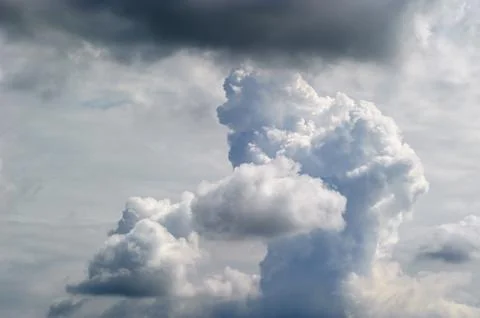 Dynamic clouds in the blue sky Stock Photos