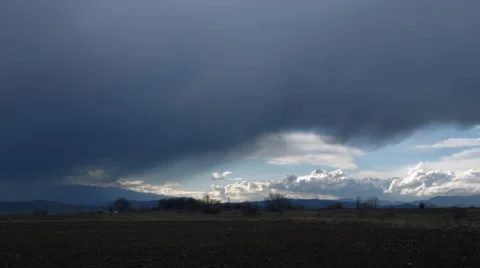 Dynamic Clouds with Heavy Rain Stock Footage 61463207