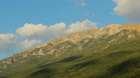 Dynamic clouds moving over mountains timelapse 4K video 스톡 동영상 68394248