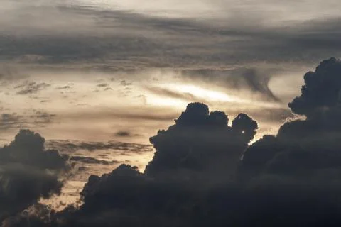 Dynamic clouds at sunset, image captured with telephoto lens Stock Photos