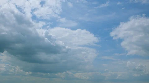 A Dynamic Cloudy Sky Filled with Open Expanses of Blue in Various Atmospheric Co Video stock 313471239