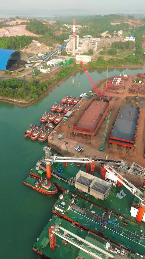 Dynamic Coastal Enterprise: An Overhead Glimpse of Extensive Vessel Operati.. Video stock 337281219