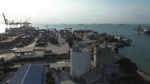 Dynamic Coastal Infrastructure: Cranes, Containers, and Vessels Define a Vi.. Video stock 339037968