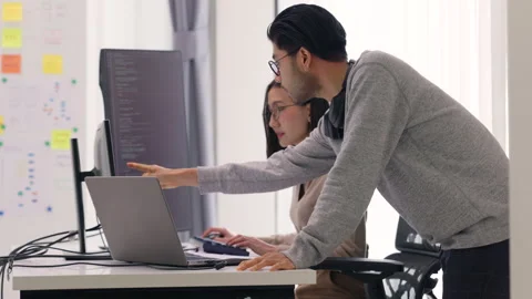Dynamic Coding Session with Male and Female Programmers. Stock Footage 273192588