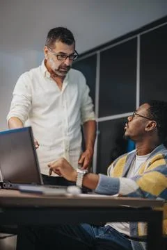 Dynamic Collaboration in Multicultural Business Environment Stock Photos