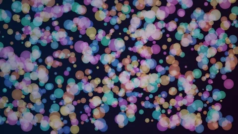 Dynamic colorful circles float against a dark background Stock Footage 325249704