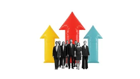 Dynamic composition of business team standing beneath giant rising arrows in Stock Photos