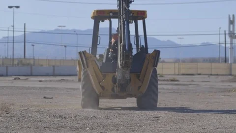 Dynamic Construction Activity: Backhoe in Action at Las Vegas Construction Site 動画素材 78710847