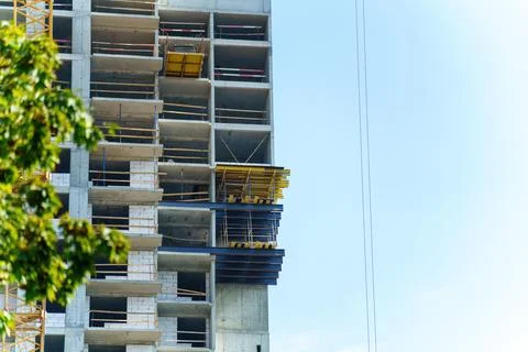 Dynamic construction site showcasing evolving architecture, with temporary st Stock Photos