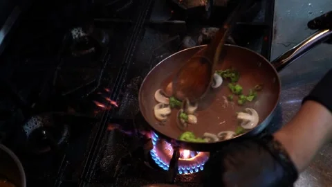 Dynamic Cooking Process in a Professional Kitchen Video stock 319207338