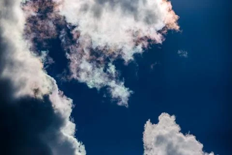 Dynamic Cumulus Clouds in Deep Blue Sky Stock Photos