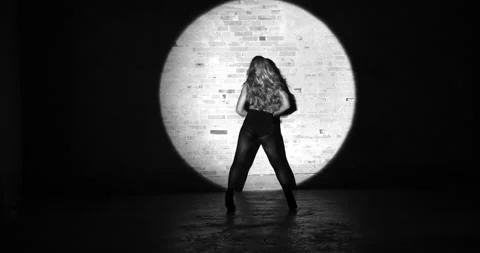 Dynamic Dancer Dances With With Backdrop of Brick Wall and Focused Light Stock Footage 158847341