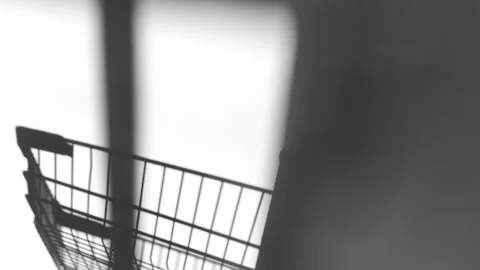 Dynamic dark moving shadow from the window sun beams blurred motion play of a Stockbeeldmateriaal 318610497