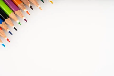 Dynamic diagonal arrangement of sharpened, vibrant colored pencils in the u.. Stock Photos