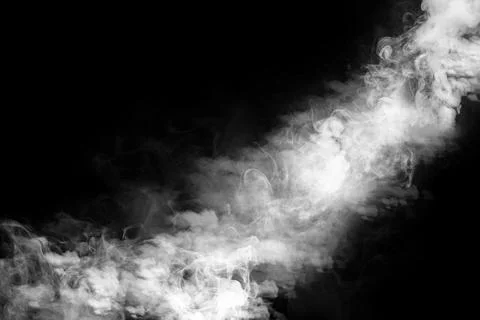 A dynamic diagonal plume of white smoke, vapor, or fog isolated against a d.. Stock Photos