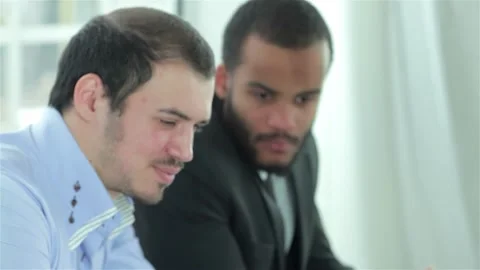 Dynamic discussion of business objectives in a modern office setting Stock Footage 311828634