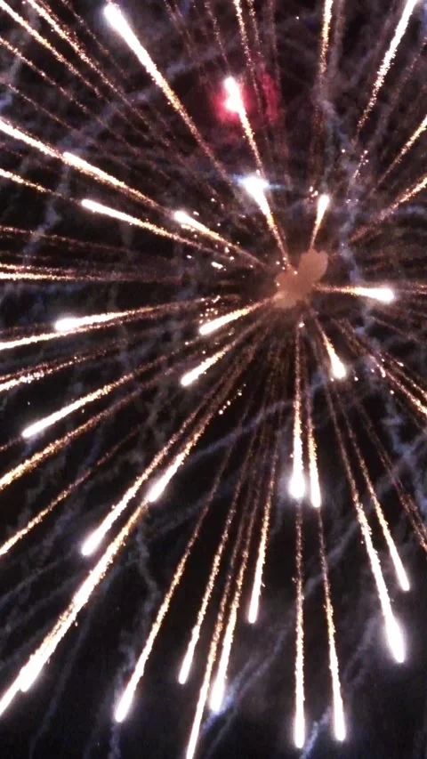 Dynamic display of exploding fireworks in the night sky with audio. 4K Video stock 340374346