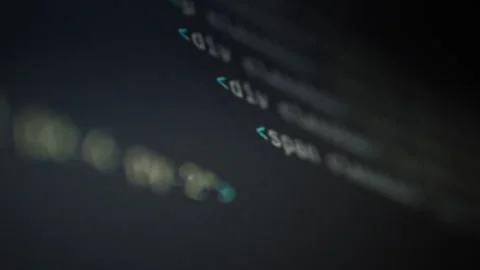 Dynamic display showcases intricate process of programming where symbols and 動画素材 336570799