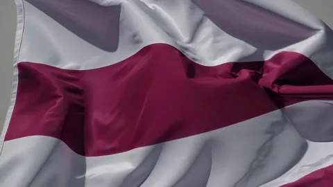 A Dynamic Display of the Waving National Flag of Latvia Set Against a Gray Stock Footage 306177146