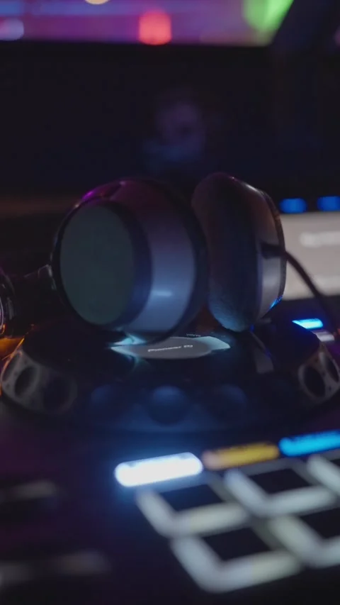 Dynamic DJ equipment with vibrant lights is perfect for music producers aiming Stock Footage 317779793