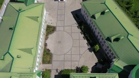 Dynamic drone descent and upward rotation near church complex in Kolomna Stock Footage 327408713