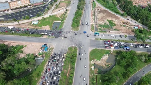 Dynamic drone footage capturing dense vehicle movement Stock Footage 320108068