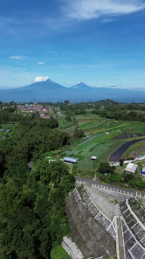 A dynamic drone shot capturing a winding rural road Stock-Footage 292594991