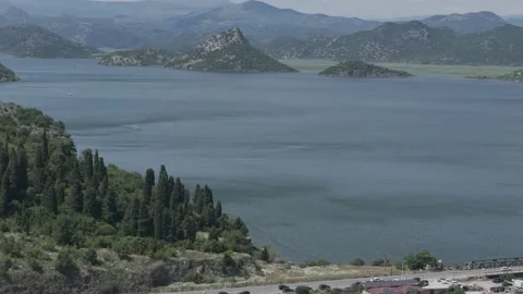 Dynamic Drone Shot of Flora, Bridge, and Boats on Skadar Lake, Montenegro Stock-Footage 310335243