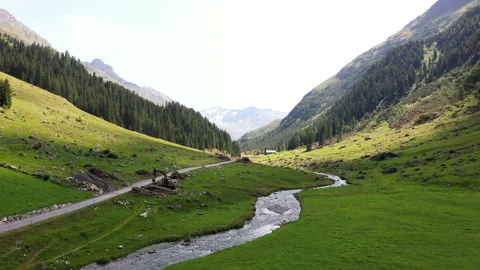 Dynamic drone shot over the Dischma valley, Switzerland. Video stock 143461702