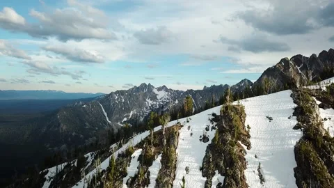 Dynamic Drone shot over Snowy Mountains Stock Footage