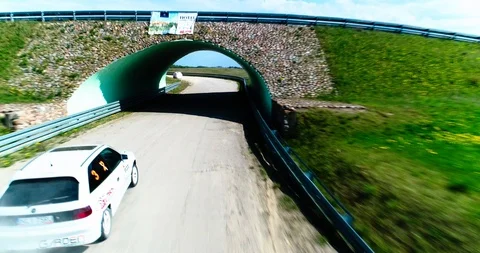 Dynamic drone shot of racing car Stock Footage 89416620