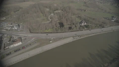 Dynamic drone shot of a river and traffic in Flanders Stock Footage 169703982