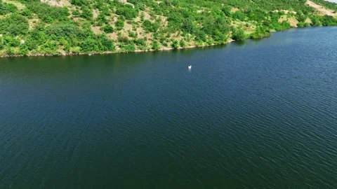 Dynamic Drone Tracking Across Boğazköy Dam Lake in İnegöl, Bursa. Stock Footage 313431645