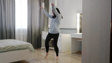 Dynamic energetic dance with flowing clothing and lively gestures 스톡 동영상 331374665