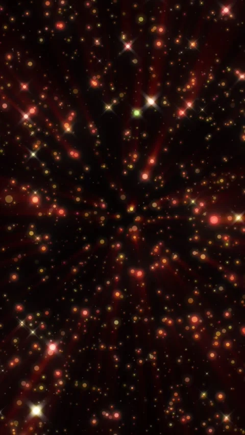 Dynamic explosion of glowing red and yellow particles in space, creating a .. Stock Footage 311929368