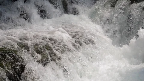 Dynamic fast flowing waterfall in slow motion Stock Footage 90332276