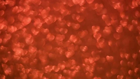 Dynamic festive blurred red background with hearts bokeh. Stock Footage 142263506