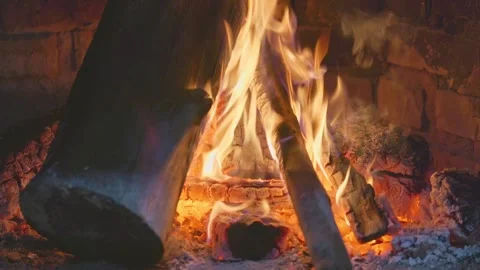 Dynamic Fire Burning Wood in a Traditional Fireplace Stock Footage 322014837