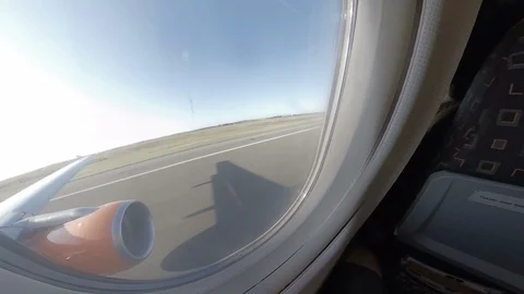 Dynamic fisheye view onboard plane as it takes off from runway v2 Stock Footage 118253297